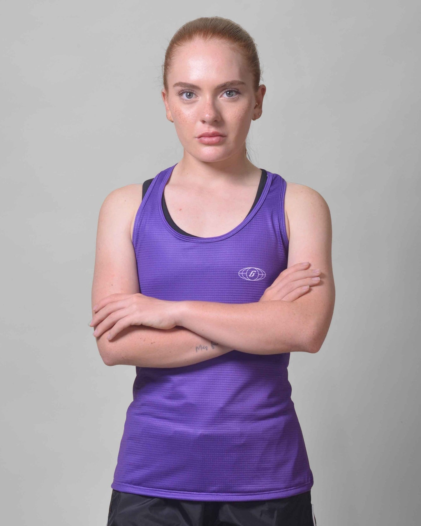 Polera Running Gavia Skipe - Camiseta de correr sin mangas. Mujer (Morado)