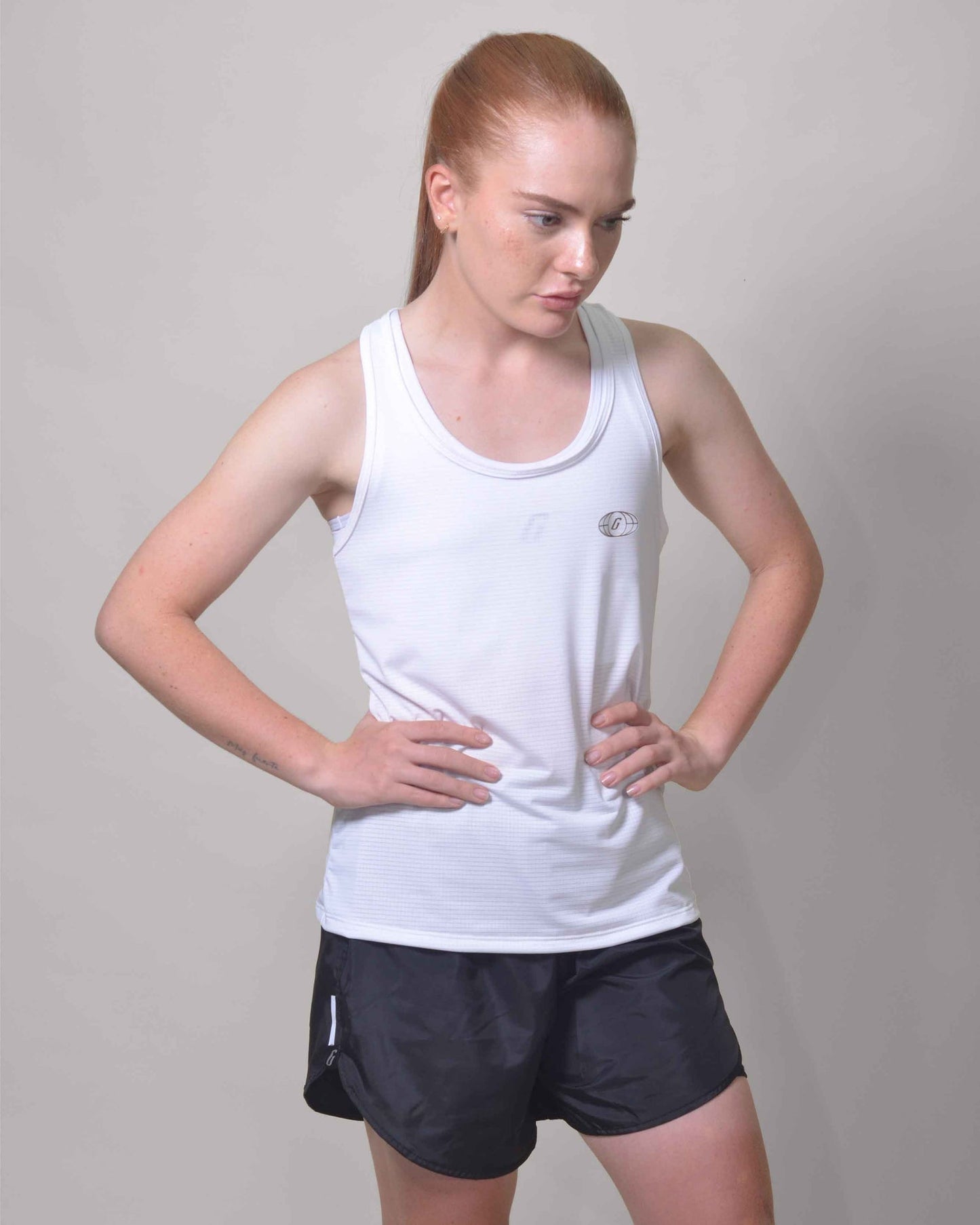 Polera Running Gavia Skipe - Camiseta de correr sin mangas. Mujer (Blanco)