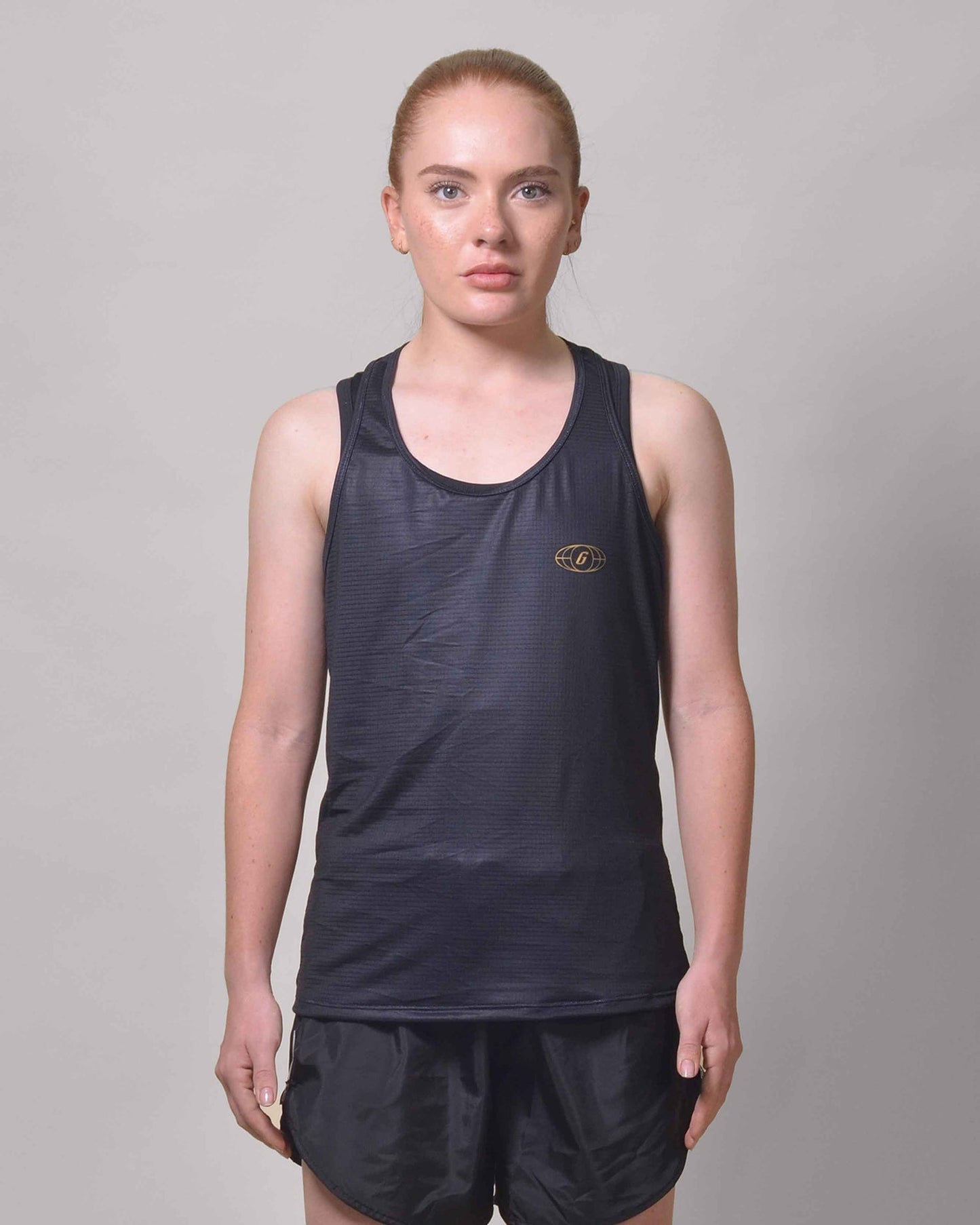Polera Running Gavia - Camiseta de correr sin mangas. Mujer (Negro Tiniebla)
