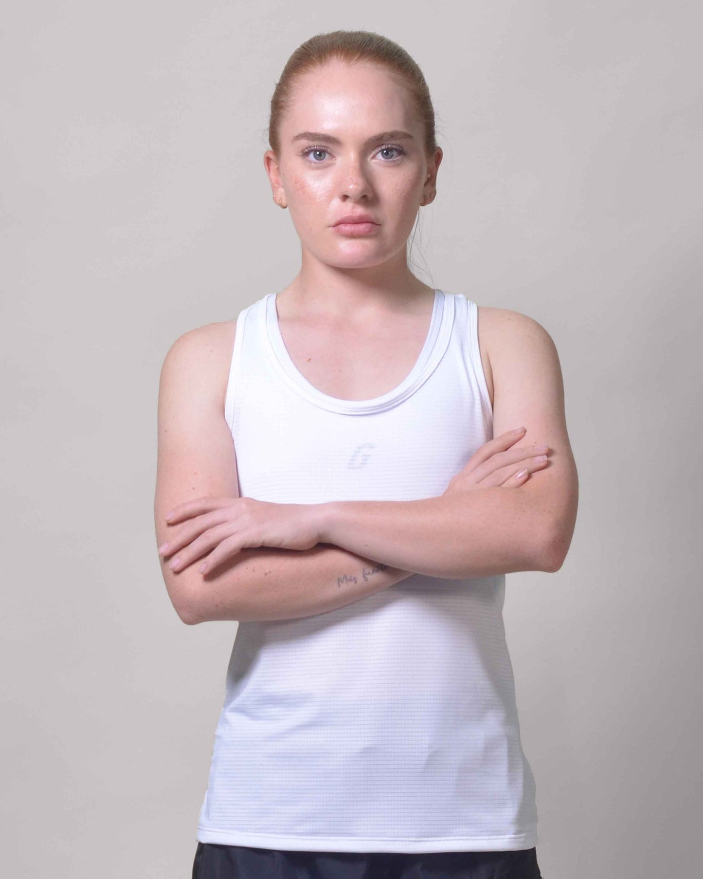 Polera Running Gavia Skipe - Camiseta de correr sin mangas. Mujer (Blanco)