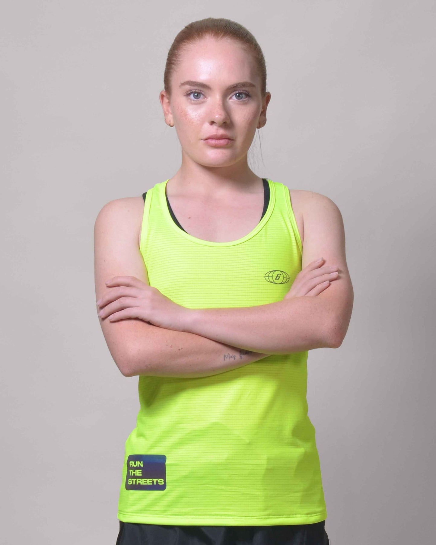Polera Running Gavia Flow Green - Camiseta de correr sin mangas. Mujer (Amarillo)