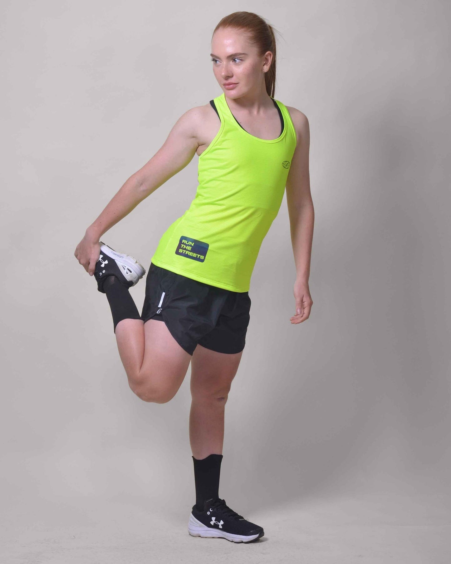 Polera Running Gavia Flow Green - Camiseta de correr sin mangas. Mujer (Amarillo)