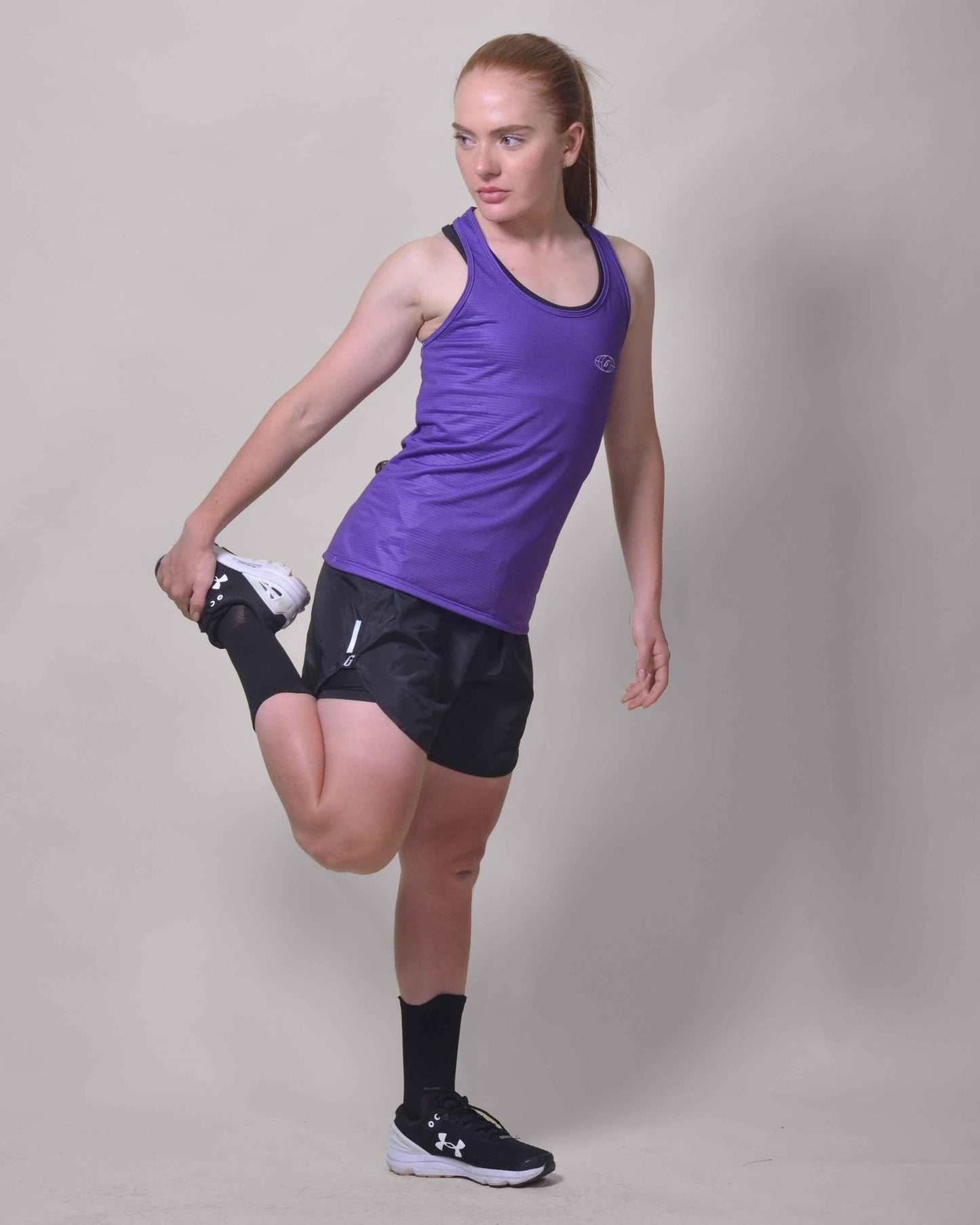 Polera Running Gavia Skipe - Camiseta de correr sin mangas. Mujer (Morado)