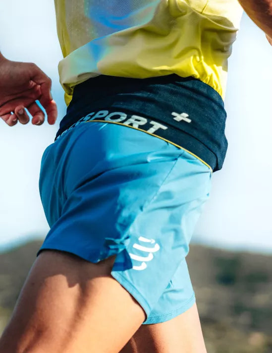 Free Belt Compressport - Banano, portanumero y más (Azul-amarillo)