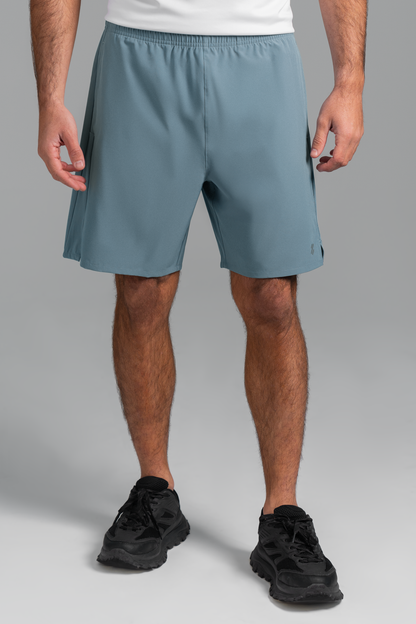 Ultimate Short Sport - Pantalones Cortos Deportivos de Hombre (Azul Stone Blue)