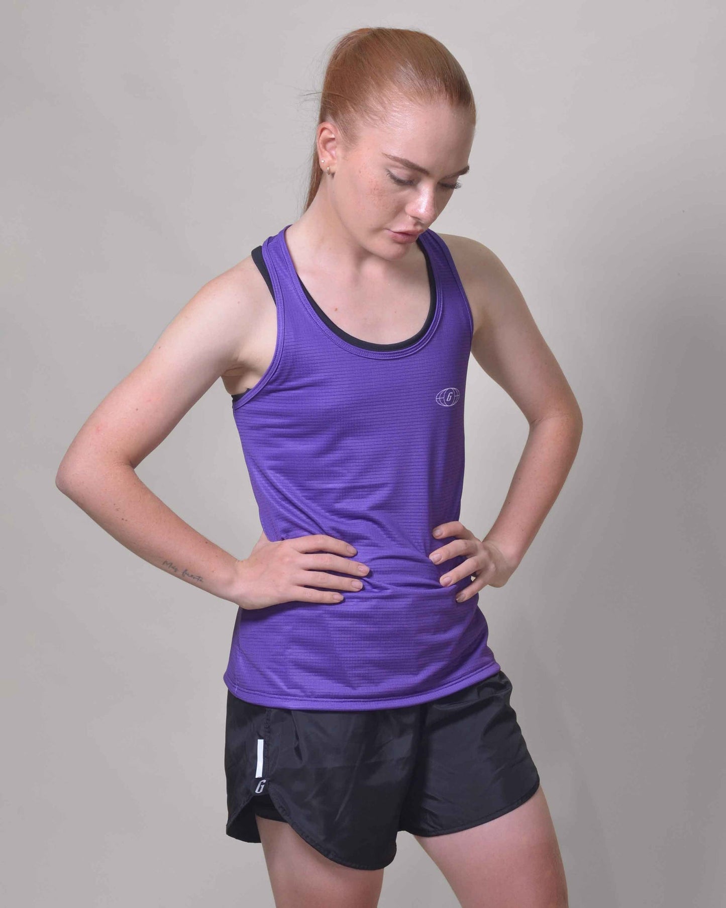 Polera Running Gavia Skipe - Camiseta de correr sin mangas. Mujer (Morado)