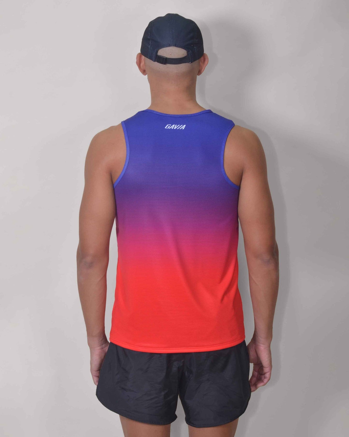 Polera Running Cool Gavia - Camiseta de correr sin mangas. Hombre (Azul rojo)