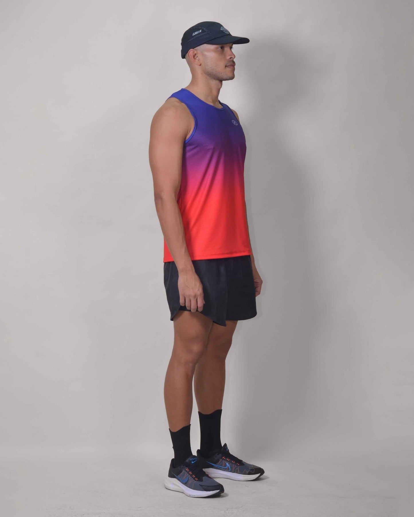 Polera Running Cool Gavia - Camiseta de correr sin mangas. Hombre (Azul rojo)