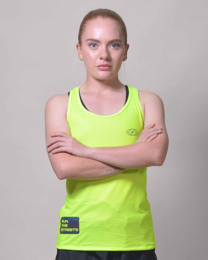 Polera Running Gavia Flow Green - Camiseta de correr sin mangas. Mujer (Amarillo)