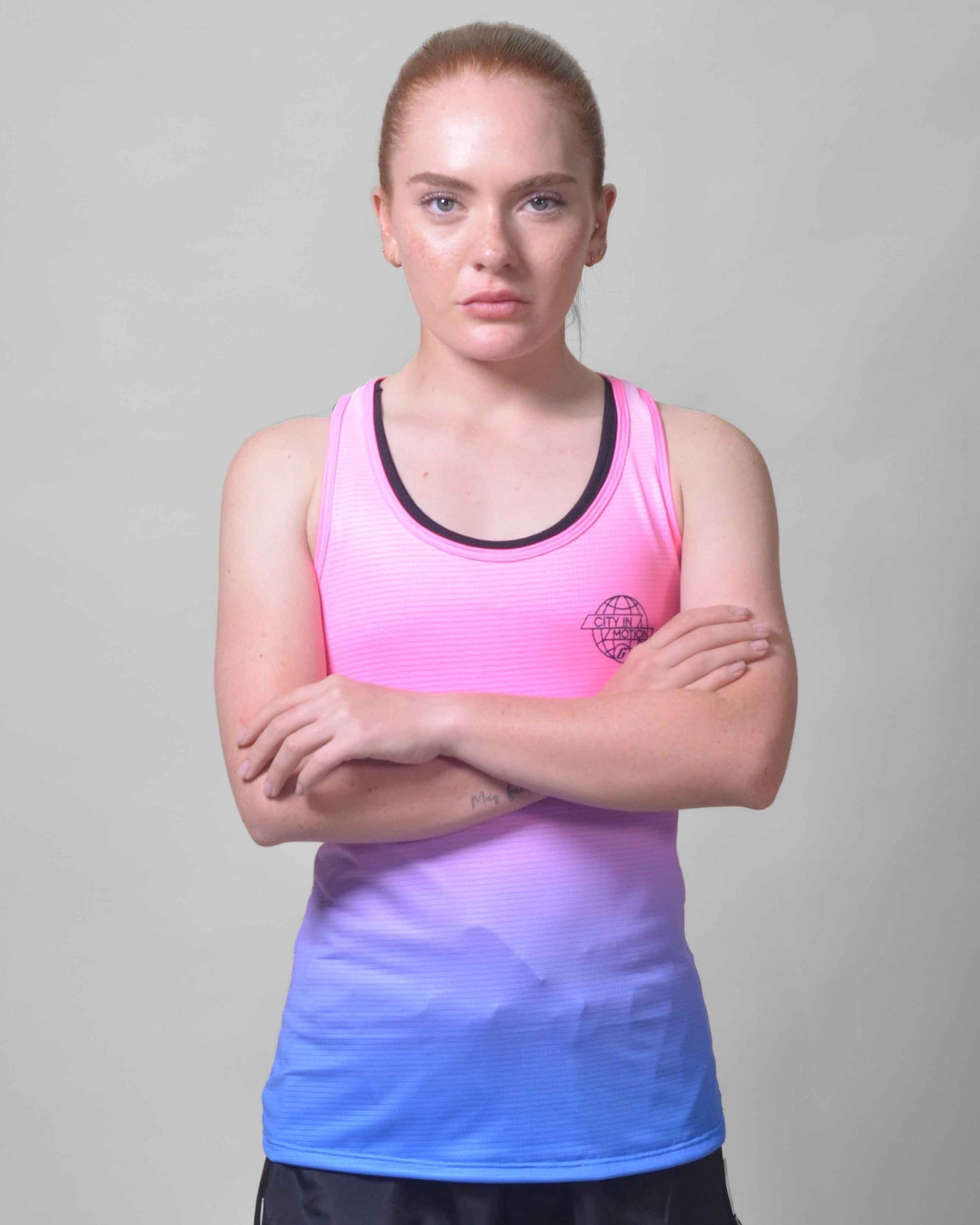 Polera Running Gavia Ping Lot - Camiseta de correr sin mangas. Mujer (Rosado azul)