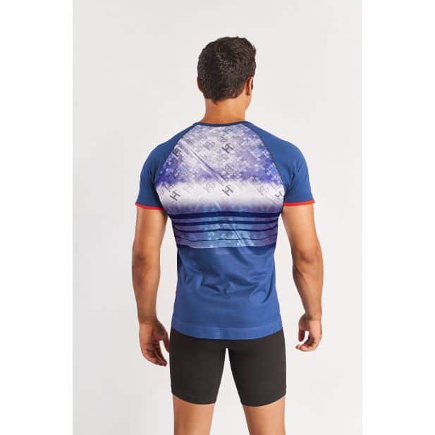 SportHG Crest – Polera de running estampada para hombre