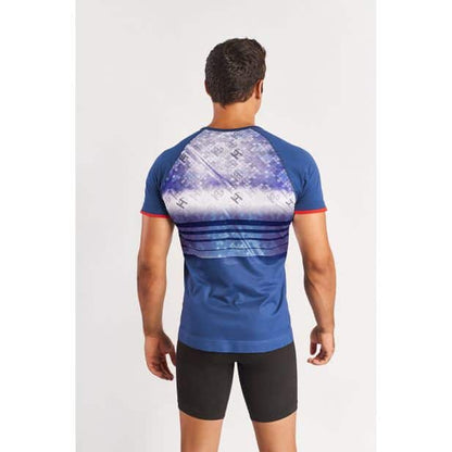SportHG Crest – Polera de running estampada para hombre