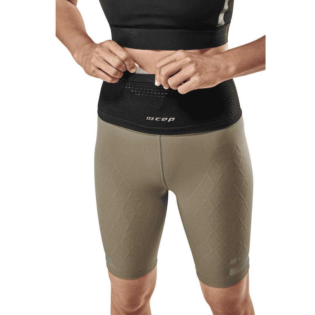 CEP Run Belt – Cinturón de running unisex con dos bolsillos.