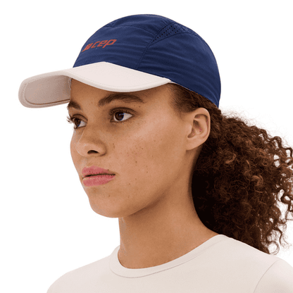 CEP Jockey Run – Protección UV 50+ y ala plegable para running unisex.