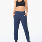 Pantalón Buzo Mujer Aspire Trackpants - Midnight/White - 2XU