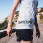 Polera Compressport Training SS Mujer Blanco *Edición Limitada Swim Bike Run 2023*